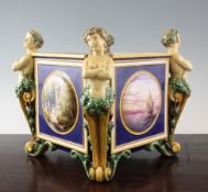 A Minton majolica square jardiniere, date code for 1859, modelled with classical terms to each