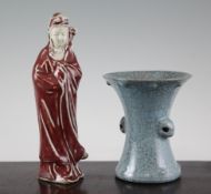 A Chinese Ge type gu-shaped crackle glaze vase and a Chinese sang de boeuf glazed standing figure of