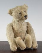 An early 20th century Steiff tumbling mechanical bear, 11.5in.