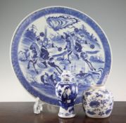 A Chinese blue and white dish, a similar jar and a small vase and cover, 19th century, the dish