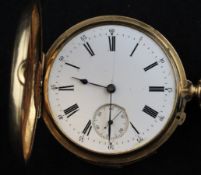 An early 20th century gold keyless lever hunter quarter repeating pocket watch, with Roman dial