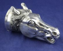 A 20th century white metal horse head stirrup cup, apparently unmarked, 6.75in.