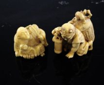 A Japanese ivory netsuke of Raiden, Meiji period, crouching with a temple bell at his back, 1.75in.,