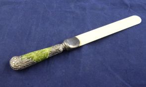 A late Victorian silver mounted marble handled ivory paper knife, by Sampson Mordan & Co, with