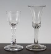 A George II wine glass, c.1740, with waisted bell shaped bowl, plain stem and conical moulded