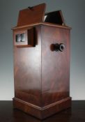 A 19th century flamed mahogany square section table top stereoscopic photograph viewer, 20in.