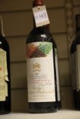 Three bottles of Chateau Mouton-Rothschild 1979, Premier Cru Classe, Pauillac; two very top shoulder