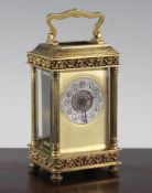 A late 19th century French gilt brass carriage timepiece, with slivered arabic chapter ring set