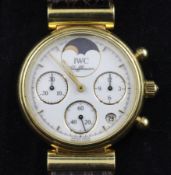 A lady`s 18ct gold IWC Schaffhausen calendar moonphase quartz wrist watch, with baton markers,