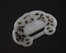 A Chinese grey-white jade ruyi shaped plaque, carved and pierced with a flower, bat, lingzhi