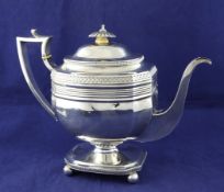 A George III silver pedestal teapot by Charles Fox I, of octagonal form, with engraved diamond motif