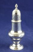 A George III silver caster, of baluster form, with spiral finial, Daniell & Mince, London, 1768, 5.