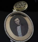 A Victorian gold mourning pendant locket, of oval form, with applied monogram and inscribed Alice