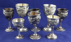 Eight early 20th century Japanese silver goblets, set of four, pair and two singles, one of the