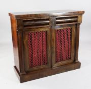 An early Victorian mahogany chiffonier, with two cushion drawers over brass grille doors, on