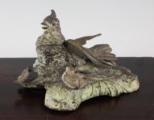 A 19th century Austrian cold painted bronze figural inkwell, modelled as a bird and chicks on a