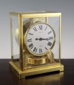 A Jaeger Le Coultre lacquered brass Atmos clock, no.248208, 8.75in.; with original box and pamphlet