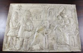 A Nottingham style composition plaque decorated in relief with the adoration of the magi, 16 x