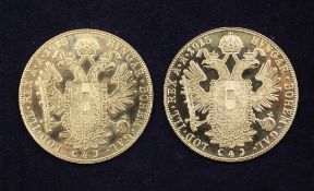 Two Austrian 1915 re-strike four ducats gold coins.