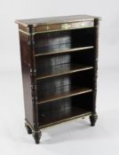 A Regency rosewood dwarf open bookcase, with brass inset frieze and three adjustable shelves, 1ft
