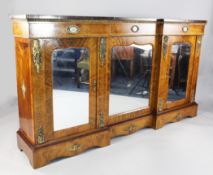 A Victorian ormolu mounted walnut and marquetry credenza, with inverse breakfront and porcelain