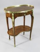 A Victorian kingwood banded figured walnut occasional / writing table, with ormolu mounts, writing