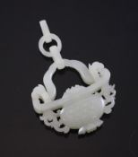 A Chinese celadon white jade pendant, 19th century, carved as a basket with scroll handles and