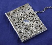 An early Victorian pierced silver rectangular card case by Nathaniel Mills, with engraved