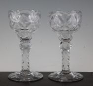 A pair of sweetmeat glasses, late 18th century, with facet cut pan-topped bowls, above facet cut