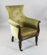 A Regency mahogany bergere armchair, with upholstered back and seat, fluted lyre shaped front rail