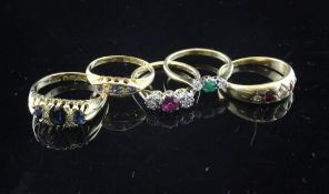 Five early 20th century 18ct gold and gem set dress rings, sapphire & diamond(2), ruby & diamond(