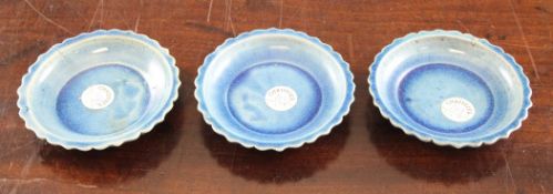 Three Chinese turquoise glazed stoneware small petal lobed dishes, Qing Dynasty, 3.75in. (9.5cm)