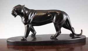 Attributed to Irenee Rochard. An Art Deco bronzed spelter model of a black panther, on black