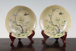 A pair of Chinese beige ground saucer dishes, Daoguang seal mark and possibly of the period, each