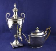 A 19th century Sheffield plate tea urn, with reeded loop handles and beaded borders, on square