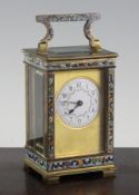 An early 20th century French gilt brass and champleve enamel carriage timepiece, with floral swag