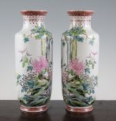 A pair of Chinese famille rose cylindrical vases, Qianlong seal mark but 20th century, each