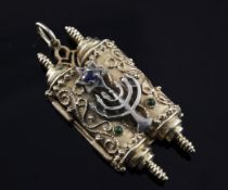 A 14ct gold and silver Judaica pendant locket, modelled and two conjoined scrolls with menorah