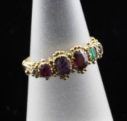 A Victorian gold and multi-gem set "Regard" ring, with carved shank and cannetile work setting, size