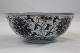 A Chinese blue and white later enamelled lotus bowl, Guangxu mark but later, 6.3in. (16cm)