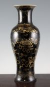 A Chinese gilt decorated black glaze baluster vase, 20th century, decorated with the Bajixian (Eight