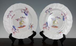 A pair of Coalport kakiemon style `yellow tiger` pattern bone china plates, c.1810-20, after Meissen