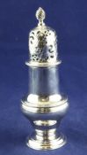 A George III silver caster, of baluster form, with rope twist borders and spiral finial, Robert
