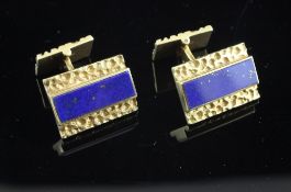 A pair of 1960`s 18ct gold and lapis lazuli set cufflinks, of rectangular form, with textured
