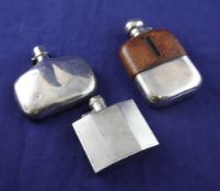 A Victorian plain silver hip flask, Sampson Mordan & Co, London, 1881, 3.75in and two other later