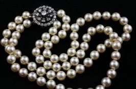 A double strand cultured pearl twin choker necklace, with circular diamond set trembleuse clasp,