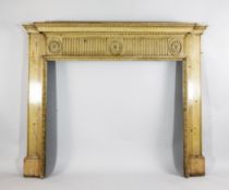 A George III carved pine fire surround, of architectural form, with acanthus leaf frieze over