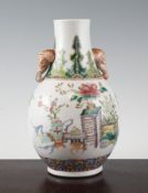 A Chinese famille rose pear shaped vase, Hu, early 20th century, painted with antiques and