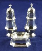 A pair of George I Britannia standard silver pepperettes, of panelled baluster form, Samuel