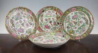 Three Chinese famille rose plates and a dish, early 20th century, each painted with butterflies amid